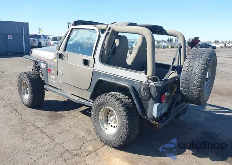 2003 Jeep Wrangler Sahara z USA, uszkodzony, nr VIN 1J4FA59S43P305628